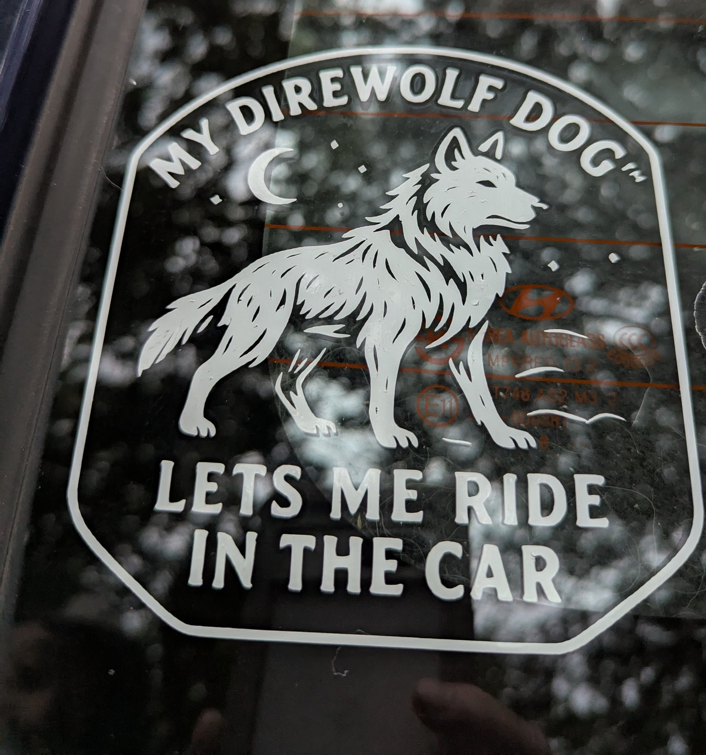 Vehicle Decal - My DireWolf Dog™ Lets Me Ride in the Car - Vinyl